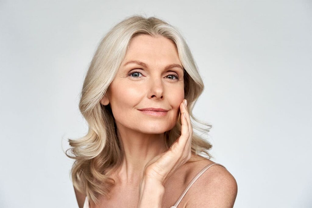 Mature woman considering a second procedure for her face with an experienced surgeon.